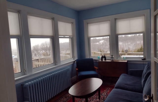 Large Summer House with the stunning views, four bedrooms, deck and hot tub!