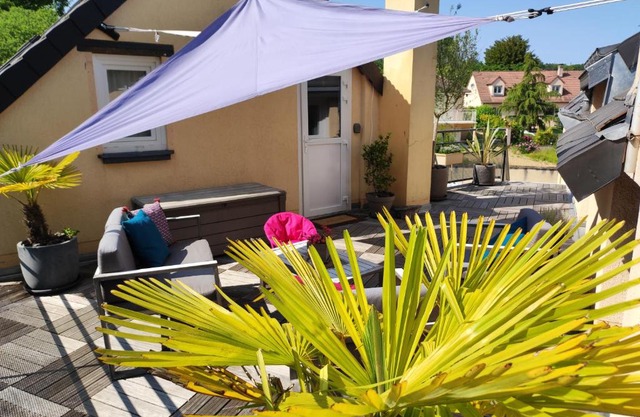 "Le Rooftop de la fontaine" dans cadre verdoyant