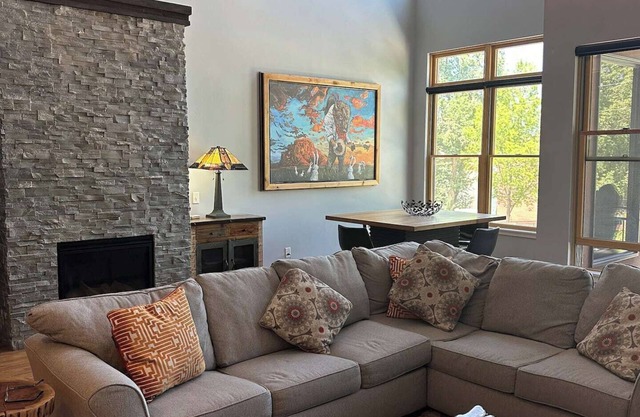 Lofted condo on the boat ramp, downtown Salida, king bed plus super comfortable queen murphy bed and sleeper sofa. Two levels, two bathrooms, parking spot in garage included.