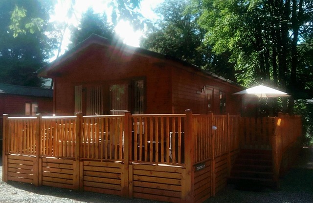 Log Cabin On Shores Of Lake Windermere, Surrounded By Breathtaking Scenery