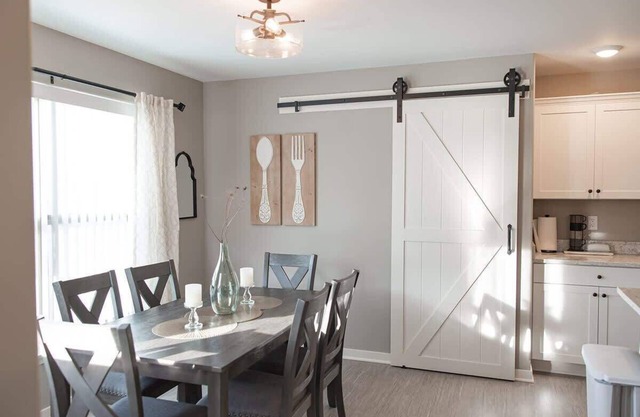 Loves Park Home: 3BR, Garage, King Bed & Family Fun