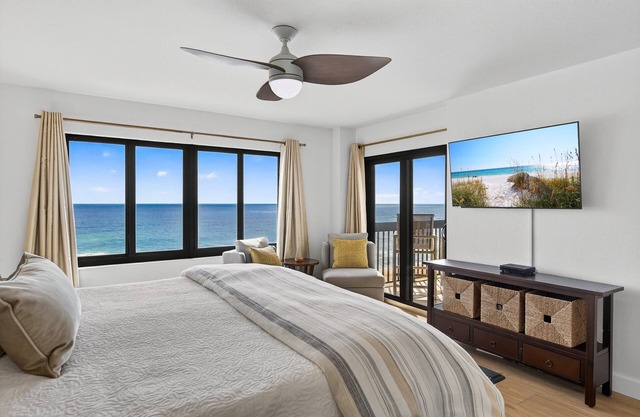 Luxury direct oceanfront corner with a large private balcony, heated pool and garage