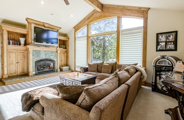 Luxury home with fireplaces, AC, home office, & 2-car garage, sleeps 10