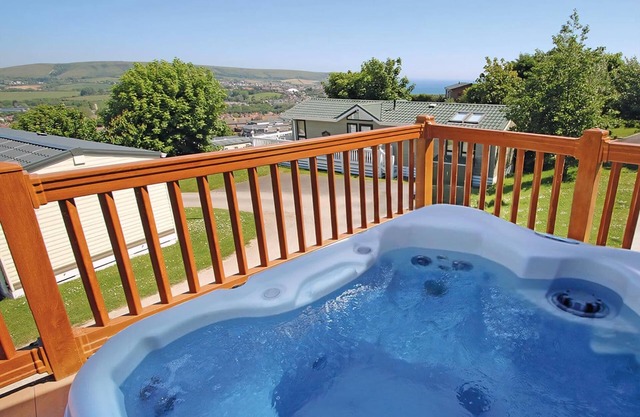 Luxury lodge with one double with en suite shower and one twin.