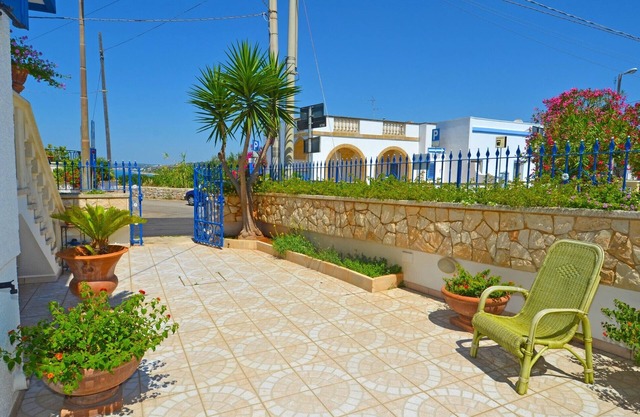 Luxury villa with large terrace and sea view garden