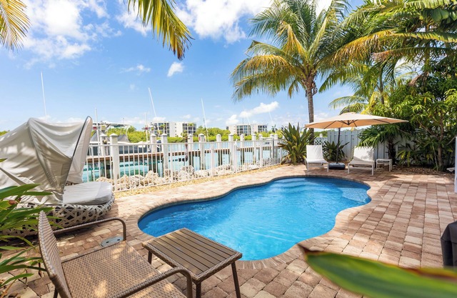 Luxury Waterfront Oasis, Private Pool, Dock, Pet-Friendly 4BR/3BA Prime Location