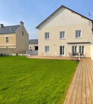 Maison au sein d’un corps de ferme.