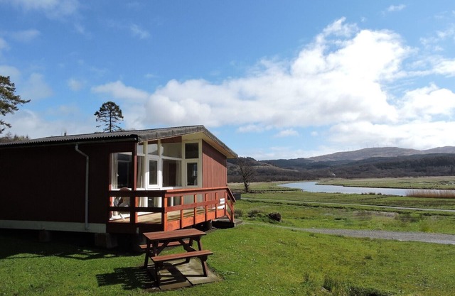 Malabar Chalet with Full Length Windows and Spectacular Loch Views