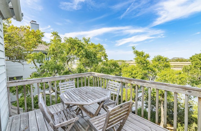 Marsh view top unit condo recently remodeled located in center of island. Pet Friendly!