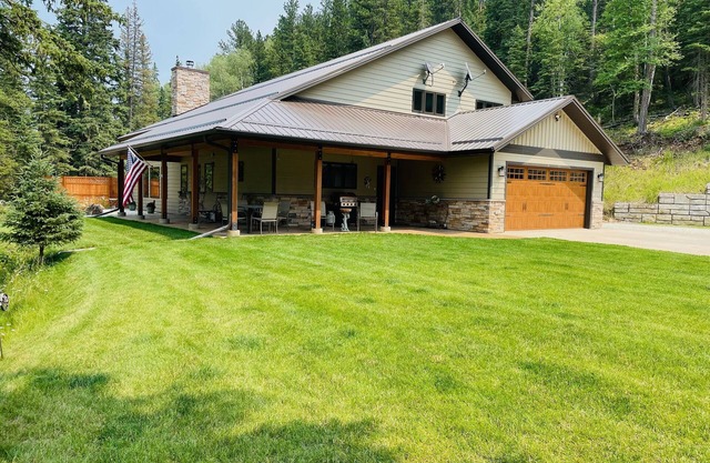Modern and spacious cabin nestled along the banks of Elk Creek.