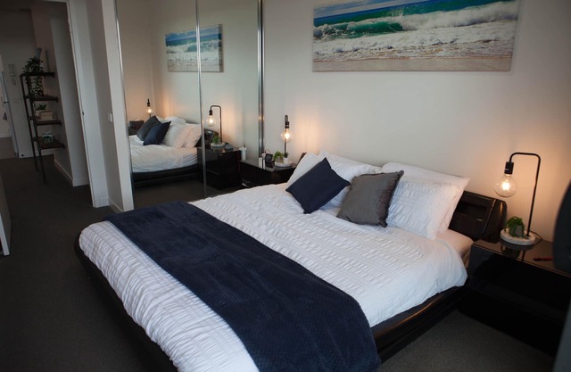Modern spacious 1BDR, wifi, EV charging & parking, close to shops
