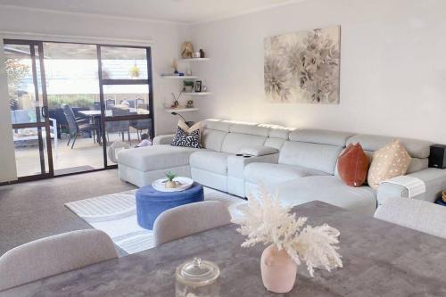 Modern three bed two and a half bath with in and outdoor flow plus study