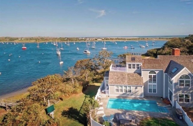 New for 2025! Lovely home with heated pool, dock and the best views! RPMS158