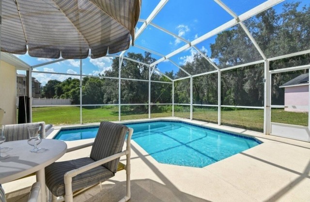 NEW! Reserve Retreat - Gated 4BR with Pool Near Disney