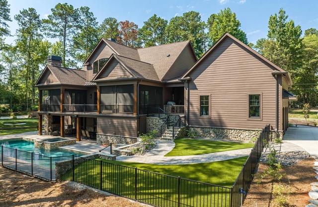 Newly constructed luxury retreat on Lake Thurmond. The sleeping arrangements for this property are 3 queen beds.