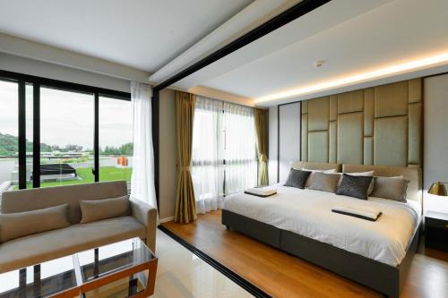 NEWLY RENOVATED apart in Mida Grande Resort by Phuket Sabay Rent - Surin Beachfront, Expansive Terrace and Pools