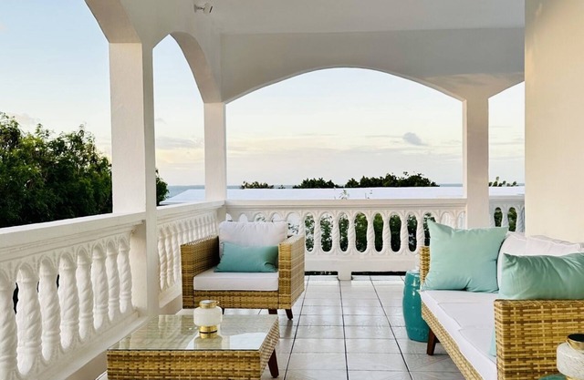 Newly Renovated Luxury West End Home Steps to Mead’s Bay and the Four Seasons.