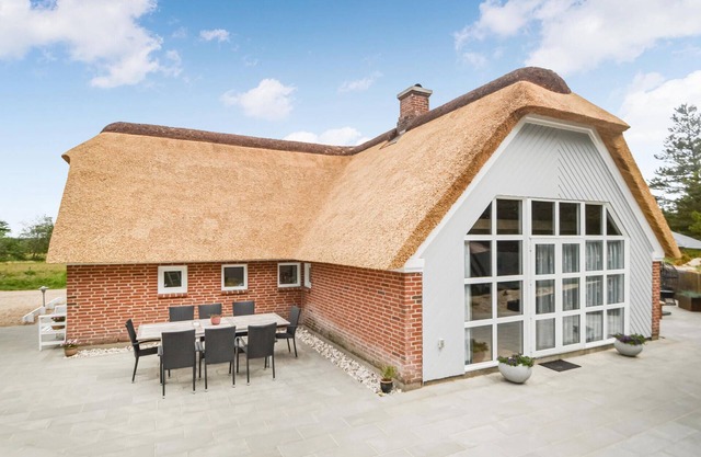 Nice home in Oksbøl with sauna