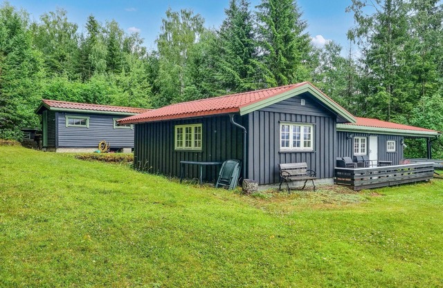 Nice home in Sagstua with lake view