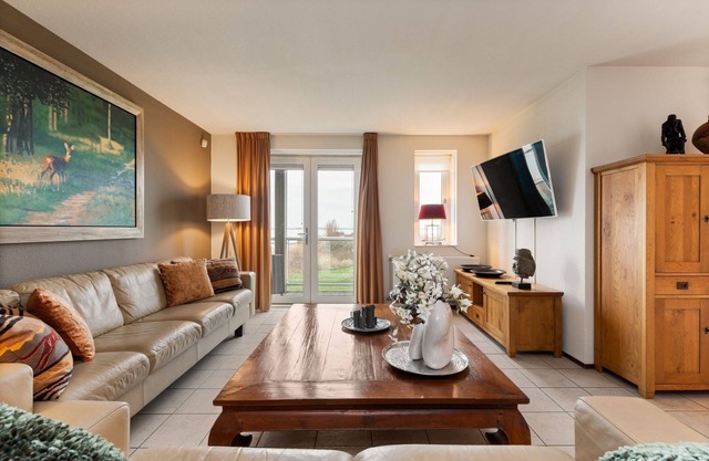 Nicely furnished 4-pers. apartment with unique harbor view located at Cape Helius holiday park.