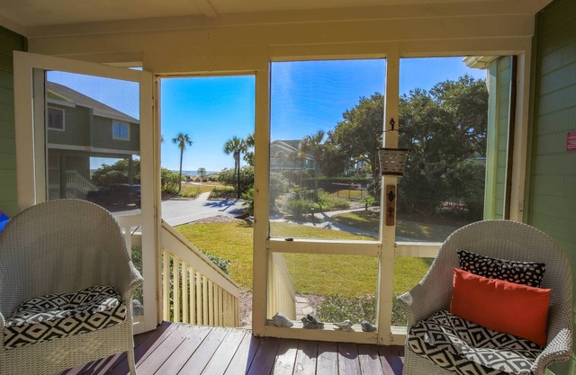 Ocean Views! Wonderful Screened Porch w/Exterior Door to Access the Community Pool or Wide Beach