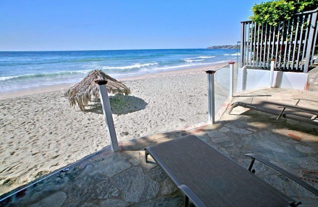 Oceanfront Cottage is on the sand in heart of Laguna Beach Village