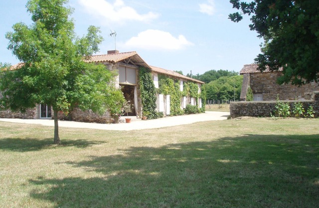 Old farmhouse renovated in a setting of meadows and forests.