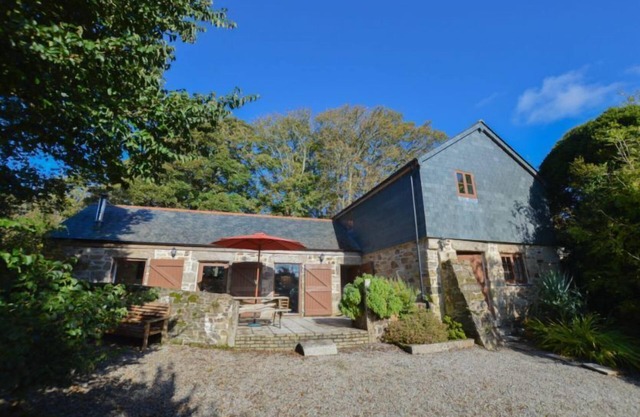 One of two charming cottages located within the grounds of Cusgarne House.