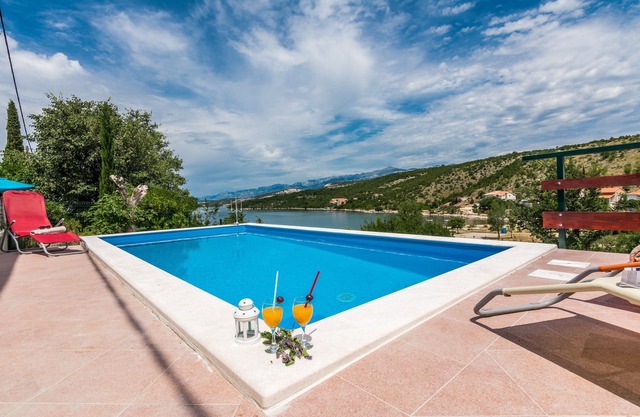 Only 30m from beach, newly furnished, wit beautiful view and outside pool.