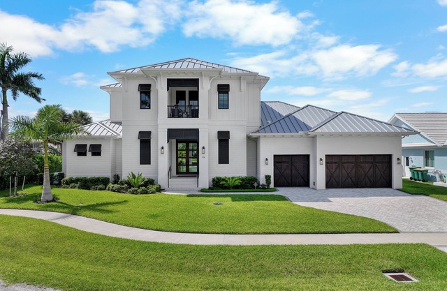 Opulent custom waterfront home w/heated pool & spa
