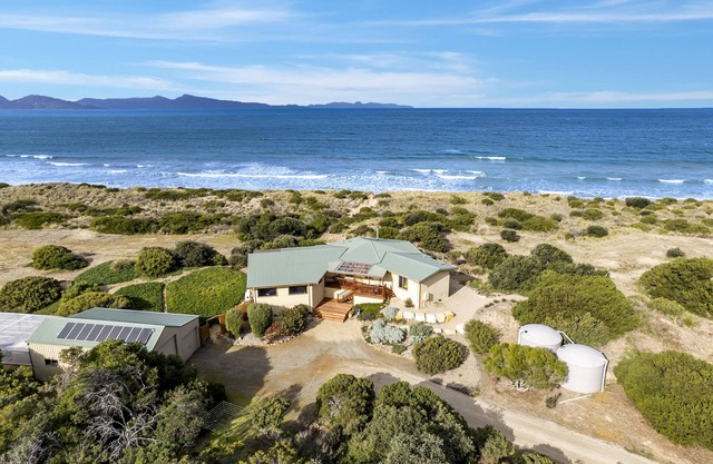 Peace & Plenty - beachfront hideaway with an indoor heated pool