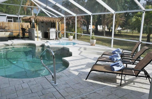 Peachland getaway with pool and tiki bar