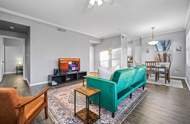 Radiant 2BR 2BA Apartment with Pool and Comfort