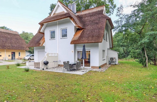 Reetdachhaus Waldidylle