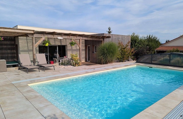 Refined holiday home with terrace and shared pool