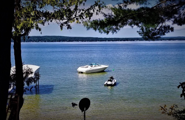 Relax On Beautiful Burt Lake. Year-round Comfort In This Lake-front Chalet.