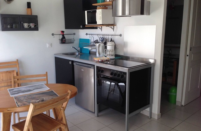 Rent air-conditioned studio with mezzanine in the center of the village and view of the church
