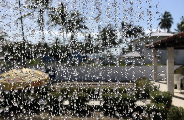 Rest, foot in the sand and tranquility