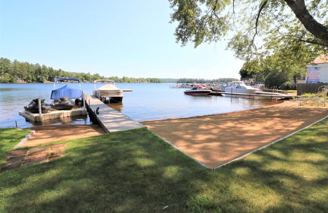 Right on the Water at Lake Winnisquam, w/Balcony, Boat Dock, & Sandy Beach