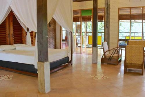 Riverside villa in tropical setting