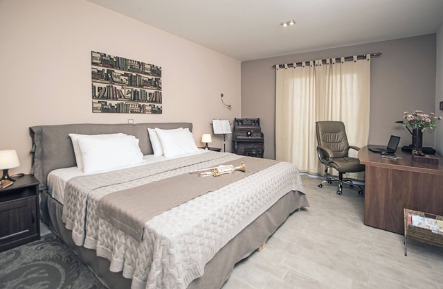 Roof Garden Villa is located on the hill top near Gouvia with beautiful views.