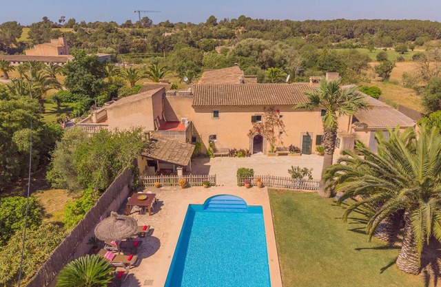 Rustic country typical country house with large pool and lawn area