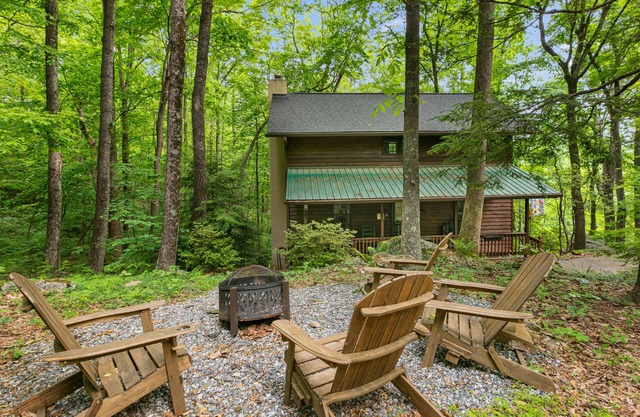 Rustic log cabin in Rumbling Bald with firepit, deck, & pool access