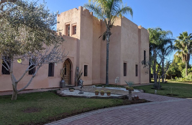 Set beside an olive grove the poolside villa is 12 mn away from Marrakech by car