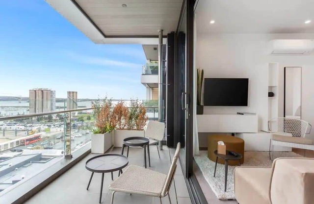 Sleek Modern Studio with Balcony by Zodiak Stays