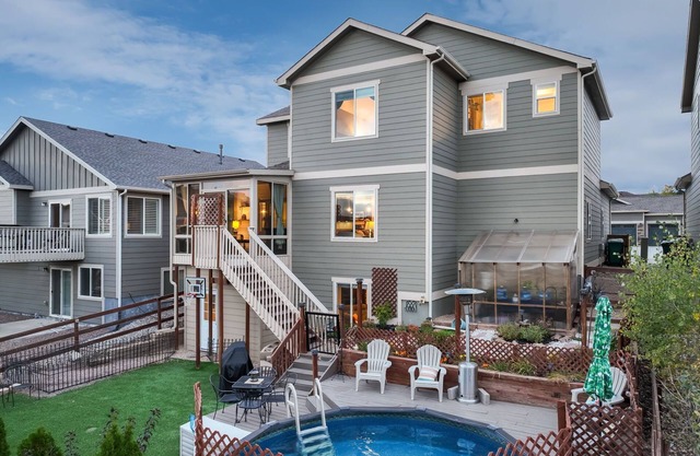 Spacious 5 Bedroom Home With Mountain Views, Heated Pool, & Sunroom!
