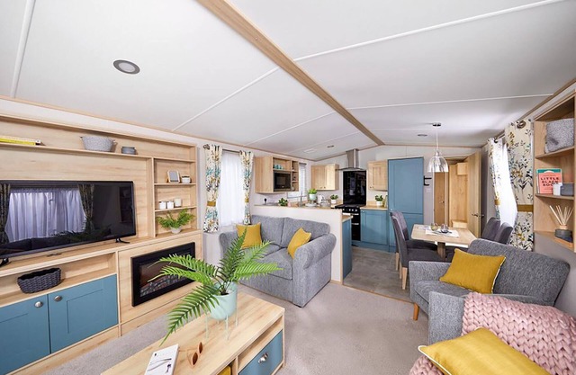 Spacious and modern 12ft-wide caravan with one double and two twin.