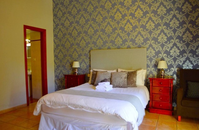 Spacious Family room that can accommodate up to 2 adults and 1 child. En-suite bathroom with shower. There is a king size bed and a single bed if required. The room has views of the village square.