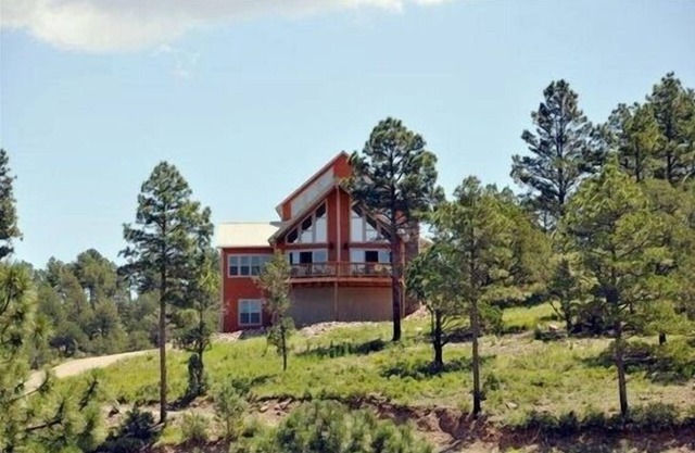 Spectacular panoramic mtn views from this majestic 3 acre luxury chalet retreat