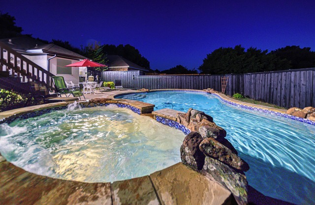 Steps From The Lake with 5 Bedrooms & 4 Baths, Heated Pool and Hot Tub!